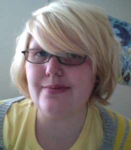 Valerie Smiling with glasses and blond hair