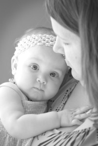Kristen with baby in black and white