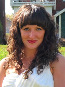 Jessica Shaw smiling in a white dress