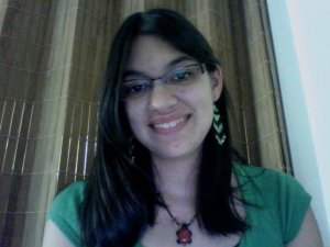 Raeanne smiling in a green shirt