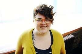 Kate Palmer in yellow sweater