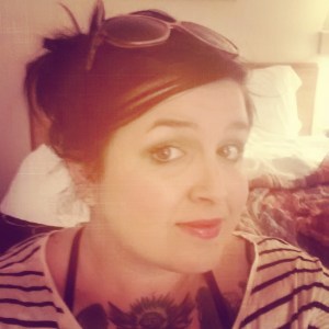 Michelle looking at camera with glasses on head