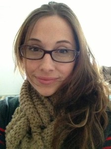 Photo of Karly with glasses and scarf